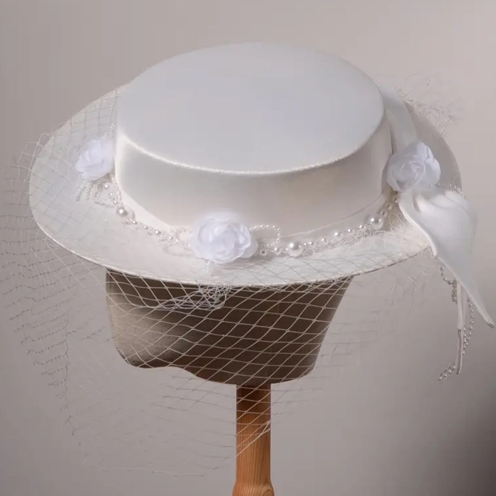 White bridal hat with veil